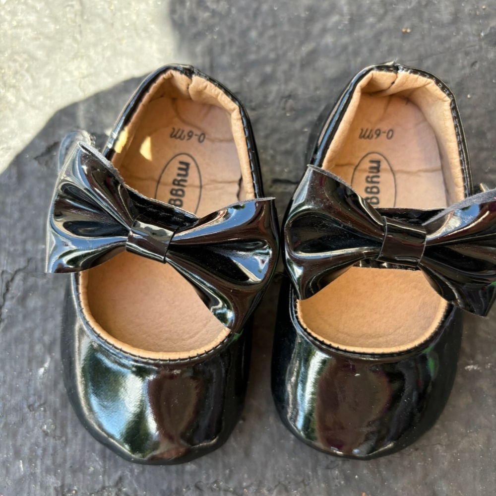 Black patent leather Mary Jane’s baby girl